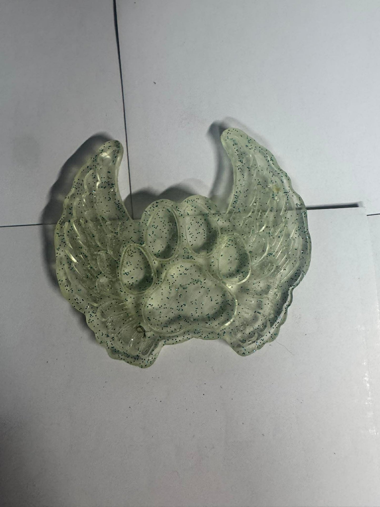 Resin paw with wings
