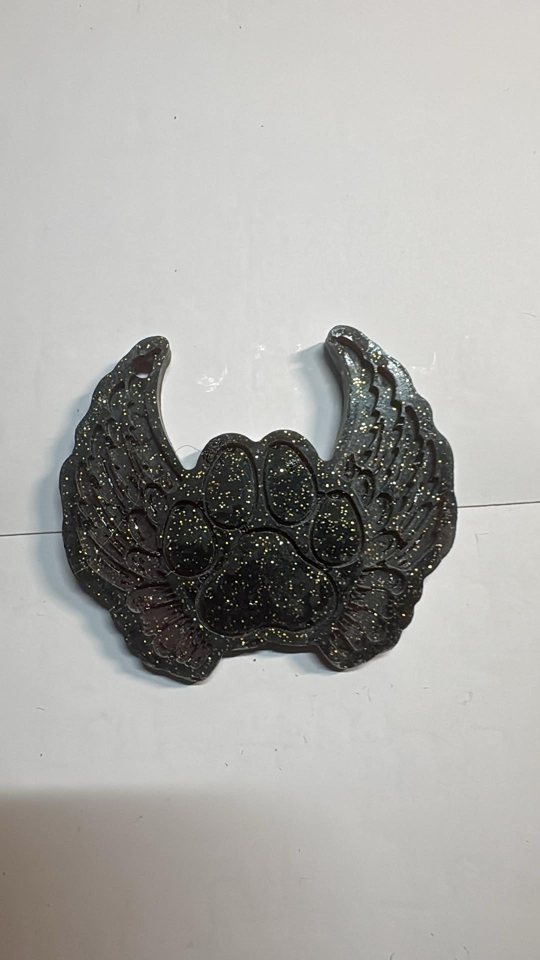 Resin paw with wings